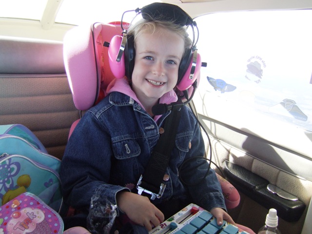 Name:  Sarah in the plane on the way.jpg
Views: 599
Size:  89.9 KB